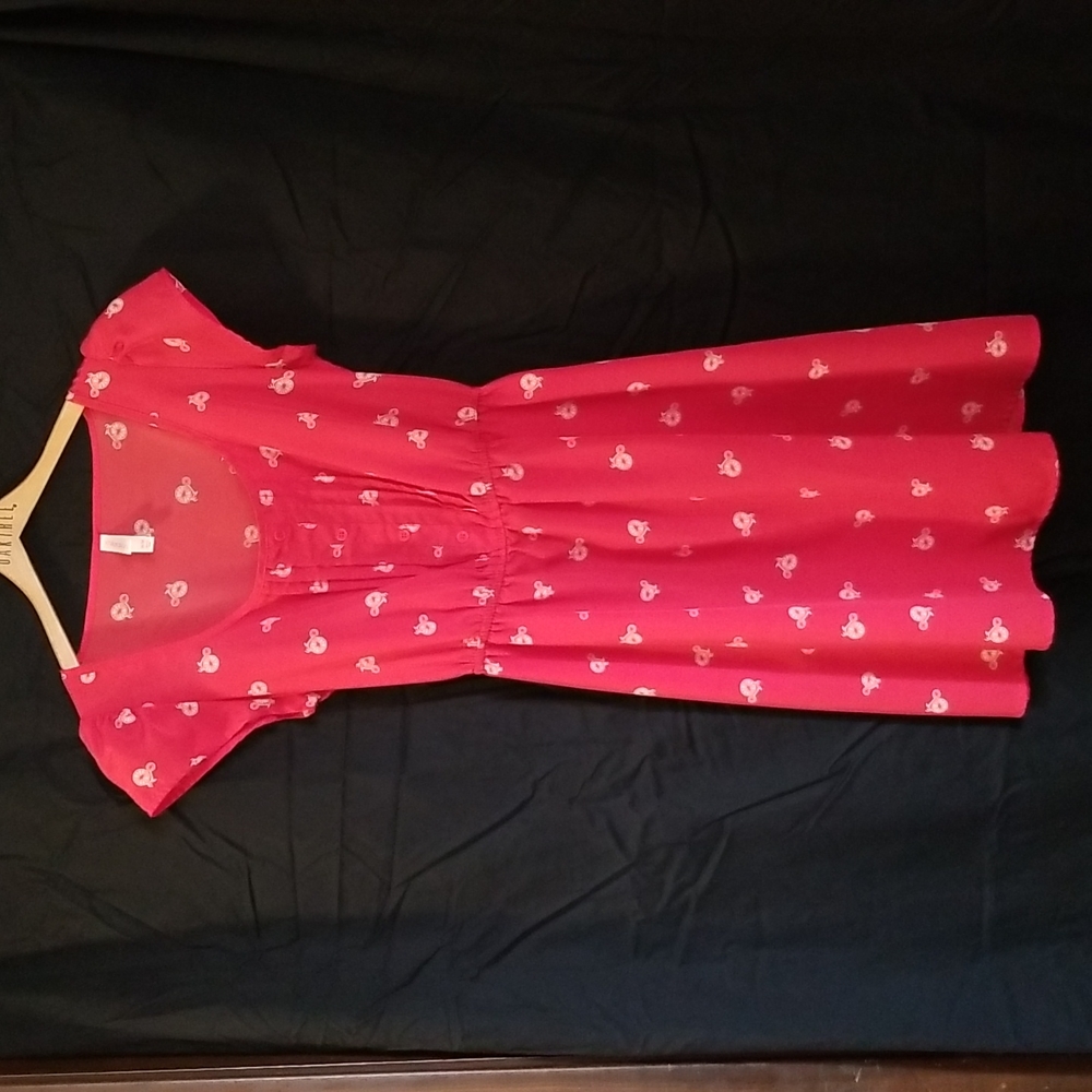 Red penny-farthing print dress